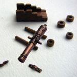 Cañón con cureña de madera