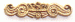 Ornamento de latón