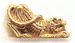 Ornamento de latón