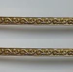 Moldura de latón