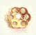 Ornamento de latón