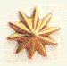 Ornamento de latón